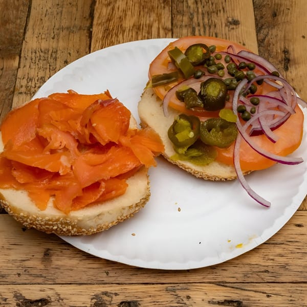 Bagel Culture's open-faced bagel with lox, tomatoes, red onions, capers, and jalapeños.